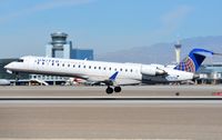 N787SK @ KLAS - United Express CL700 landing - by FerryPNL