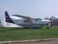 N727FX @ OSH - The feds - by Christian Maurer