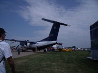 N803MR @ OSH - Homeland Security Dash 8 - by Christian Maurer