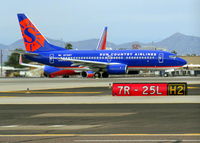 N713SY @ PHX - Taking off from PHX 7L.  New 'Sun Country' graphic. - by aubergaz