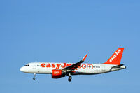 G-EZOI @ EKCH - G-EZOI landing rw 22L - by Erik Oxtorp
