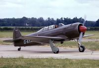 G-AYAK @ EGSU - Yakovlev Yak-C11 [172701] Duxford~G 28/06/1975. From a slide.