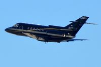 N777VW @ KLAX - Carter Charters HS800 climbing out of LAX - by FerryPNL