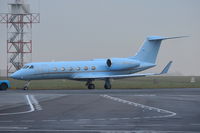 A6-FLH @ EGSH - Fresh out of spray and under tow on a foggy morning. - by Graham Reeve