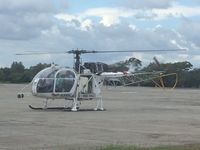 HP1658HC @ MPDA - Just took my attention while boarding a Air Panama flight in David Panama, this helicopter has the engine completely uncovered with no cowlings whatsoever, so i just starting wondering , what if, FOD or fire containment. - by VALLEJO
