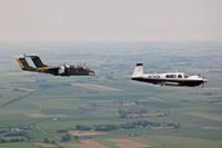 N214DA @ EGMH - Ovation & Bronco in formation - by Gregory Sutton