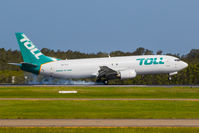 ZK-TLJ @ YBBN - Landing hard in a crosswind