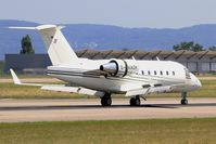 D-AAOK @ LFSB - Canadair Challenger 604, Reverse thrust landing rwy 15, Bâle-Mulhouse-Fribourg airport (LFSB-BSL) - by Yves-Q