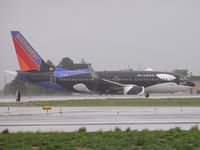 N715SW @ KBOI - On Alpha headed for RWY 28R on a very wet afternoon. One of two Shamus. The other being N713SW. - by Gerald Howard