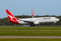 VH-XZI @ YBBN - Touchdown! - by V8Bathurst888