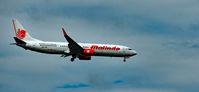 9M-LNG @ LGK - Malindo Air Boeing 737-9GP(ER)(WL) airplane landing at Langkawi International Airport. - by miro susta