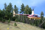 N86SL - N86SL R44 departing a roadside helipad near Custer SD - by Pete Hughes