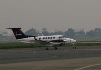 N318BF @ KCCR - FWA LLC (Stockton, CA) 1997 Raytheon Aircraft B200 arriving at foggy Buchanan Field (Concord, CA) - by Steve Nation