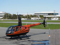 N447S @ KSQL - San Carlos Flight Center 2005 Robinson shutting down @ San Carlos Airport, CA - by Steve Nation