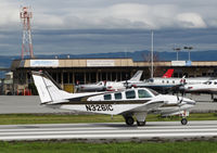 N3261C @ KSQL - Locally-based 1996 Raytheon 58 Baron rolling on take-off @ San Carlos Airport, CA - by Steve Nation