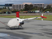 N41WB @ KSQL - Locally-based 1991 Robinson R22 BETA under wraps @ San Carlos Airport, CA helicopter ramp - by Steve Nation
