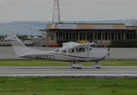 N92977 @ KSQL - Locally-based 2011 Cessna T206H Stationair rolling for take-off @ San Carlos Airport, CA - by Steve Nation