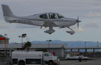 N321SL @ KSQL - Locally-based 2016 Cirrus SR20 over the threshold on raining morning @ San Carlos Airport, CA - by Steve Nation