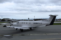 N809SA @ KSQL - Surf Air 2014 Pilatus PC-12/47E @ San Carlos Airport, CA taxiing for revenue flight to KTRK (Truckee-Tahoe Airport, CA) - by Steve Nation