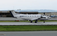 N809SA @ KSQL - Surf Air 2014 Pilatus PC-12/47E @ San Carlos Airport, CA rolling for take-off to KTRK (Truckee-Tahoe Airport, CA) - by Steve Nation