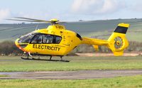 G-WPDC @ EGFP - Visiting EC-135P helicopter operated by Western Power Distribution Helicopter Unit departing the airport. - by Roger Winser