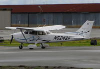 N6242F @ KSQL - Locally-based Tawny Aviation LLC 2008 Cessna 172S Skyhawk @ San Carlos Airport, CA - by Steve Nation