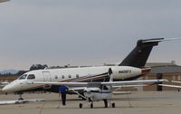 N405FX @ CMA - 2016 Embraer 545 LEGACY 450, two Honeywell HTP7500E 6,540 lbf each, max speed Mach 0.83. Guided taxi by lineman. - by Doug Robertson