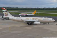 A6-EYT @ EDDL - Airbus A330-243 - EY ETD Etihad Airways 'F1 2016 Abu Dabi' - 1486 - A6-EYT - 27.04.2016 - DUS - by Ralf Winter