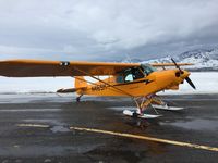 N416SM @ KLGU - Logan UT on skis - by D.Merritt