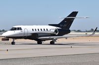 XA-JPF @ KBOI - Taxi on Alpha for RWY 28R. - by Gerald Howard