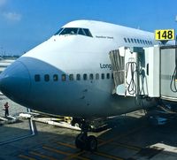 VH-OJS @ KLAX - Quotas VH-OJS (Hamilton Island), 1999 Boeing 747-438, at gate 148 KLAX - by Mark Kalfas