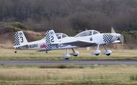 G-CJSM @ EGFH - Resident Vans RV-8 aircraft G-CJSM (Raven 2) and G-EGRV (Raven 3) departing Runway 28. - by Roger Winser