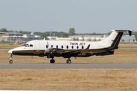 F-GLNK @ LFBD - Beech 1900D, Taxiing to holding point Delta rwy 05, Bordeaux Mérignac airport (LFBD-BOD) - by Yves-Q