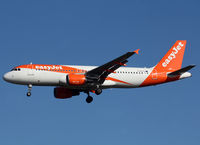 G-EZTG @ LEBL - Landing rwy 25R in new c/s - by Shunn311