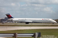 N915DL @ KSRQ - Delta Flight 2298 (N915DL) taxis at Sarasota-Bradenton International Airport prior to flight to Hartsfield-Jackson Atlanta International Airport - by Donten Photography