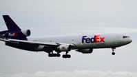 N585FE @ KOAK - Landing runway 28R North Field Oakland Airport. - by Clayton Eddy