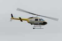C-FJSL @ CYXX - Landing - by Guy Pambrun