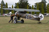 ZK-FEV @ NZMS - Manhandling between hangars at Masterton - by alanh