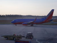 N203WN @ MCO - Boeing 737-7H4 - by Christian Maurer