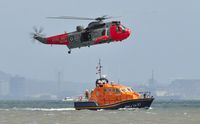 XV661 - Off airport. Royal Navy SAR helicopter modex (8)26/CU of 771 NAS undertaking an exercise with The Mumbles Lifeboat RNLI 16-27 in Swansea Bay during the Wales National Airshow 2015. - by Roger Winser