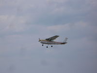 N756RF @ I69 - Cessna R182 retracting its landing gear - by Christian Maurer