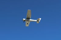 N704JH @ SZP - 1976 Cessna 150M, Continental O-200 100 Hp, takeoff climb Rwy 04, wind will shift later this morning - by Doug Robertson