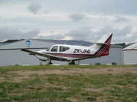 ZK-JHL @ NZAR - on grass visitor parking by cafe - by magnaman