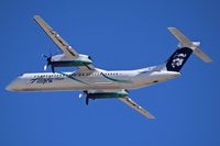 N452QX @ KBOI - Departing RWN 28R. The dark color between the blue stripes are the signatures of Horizon Air employees. - by Gerald Howard