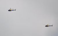 ZJ261 @ EGFH - Shawbury 16 formation (ZJ261 leading ZJ268) of RAF Eurocopter Ecureuil helicopters over the airport. - by Roger Winser