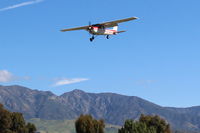 N714HH @ SZP - 1977 Cessna 150M, Continental O-200 100 Hp, another on final Rwy 22 - by Doug Robertson