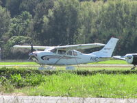 ZK-NVC @ NZAR - long shot across grass to ?new resident? - by magnaman