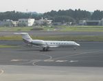 B-90609 @ RJAA - Taxying for departure - by Keith Sowter