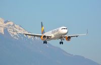 G-TCDM @ LOWI - Landing at LOWI with the austrian alps in the background - by Paul H