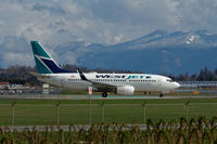 C-FZWS @ CYXX - Ready to depart - by Guy Pambrun
